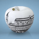 Mela City con skyline urbano stilizzato, oggetto di home decor moderno