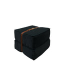 Pouf design Docker in velluto nero con dettagli in pelle