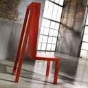 Sedia design Exercice Rouge vista laterale in ambiente industriale