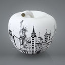 Mela City monocromatica con incisioni architettoniche urbane, oggetto di home decor