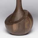 Dettaglio base tornita del tavolino da caffè Achille in legno