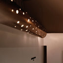 Lampada da parete Tunnel che crea giochi di luce sulle pareti