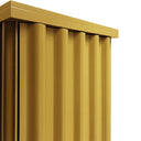 Dettaglio frontale pannellatura ondulata Curl Cabinet finitura oro