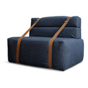 Poltrona design Docker in velluto blu con dettagli in pelle