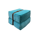 Pouf design Docker in velluto azzurro con dettagli in pelle