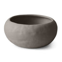 Ciotola Meteora in ceramica chiara, texture artigianale visibile.