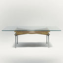 Tavolino da caffè di design con piano in vetro e base in legno