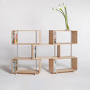 Libreria modulare Continua cinque moduli con vaso decorativo