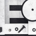 Dettaglio piano tavolino Tellap con elementi in marmo